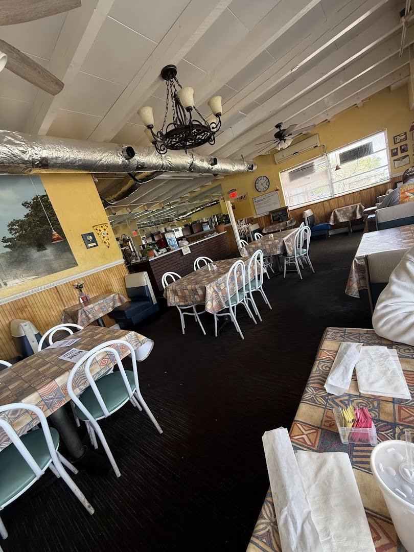 Casual restaurant interior with warm, quiet seating.